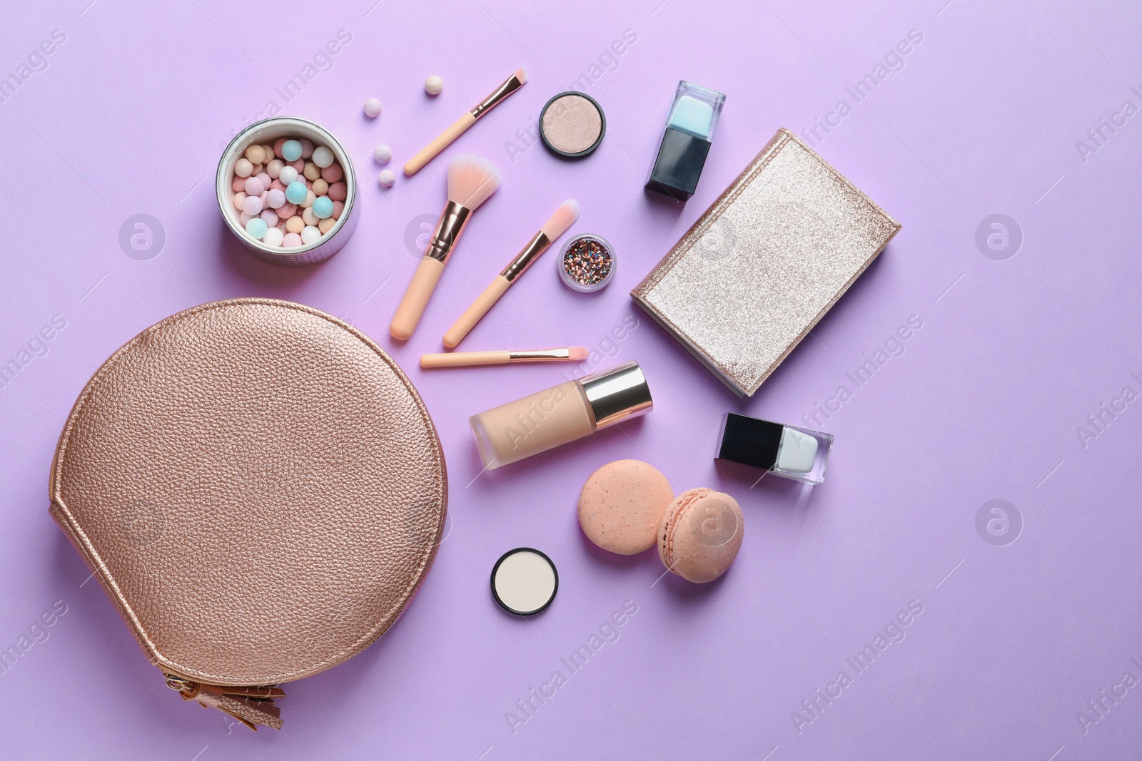 Photo of Makeup products with cosmetic bag on color background