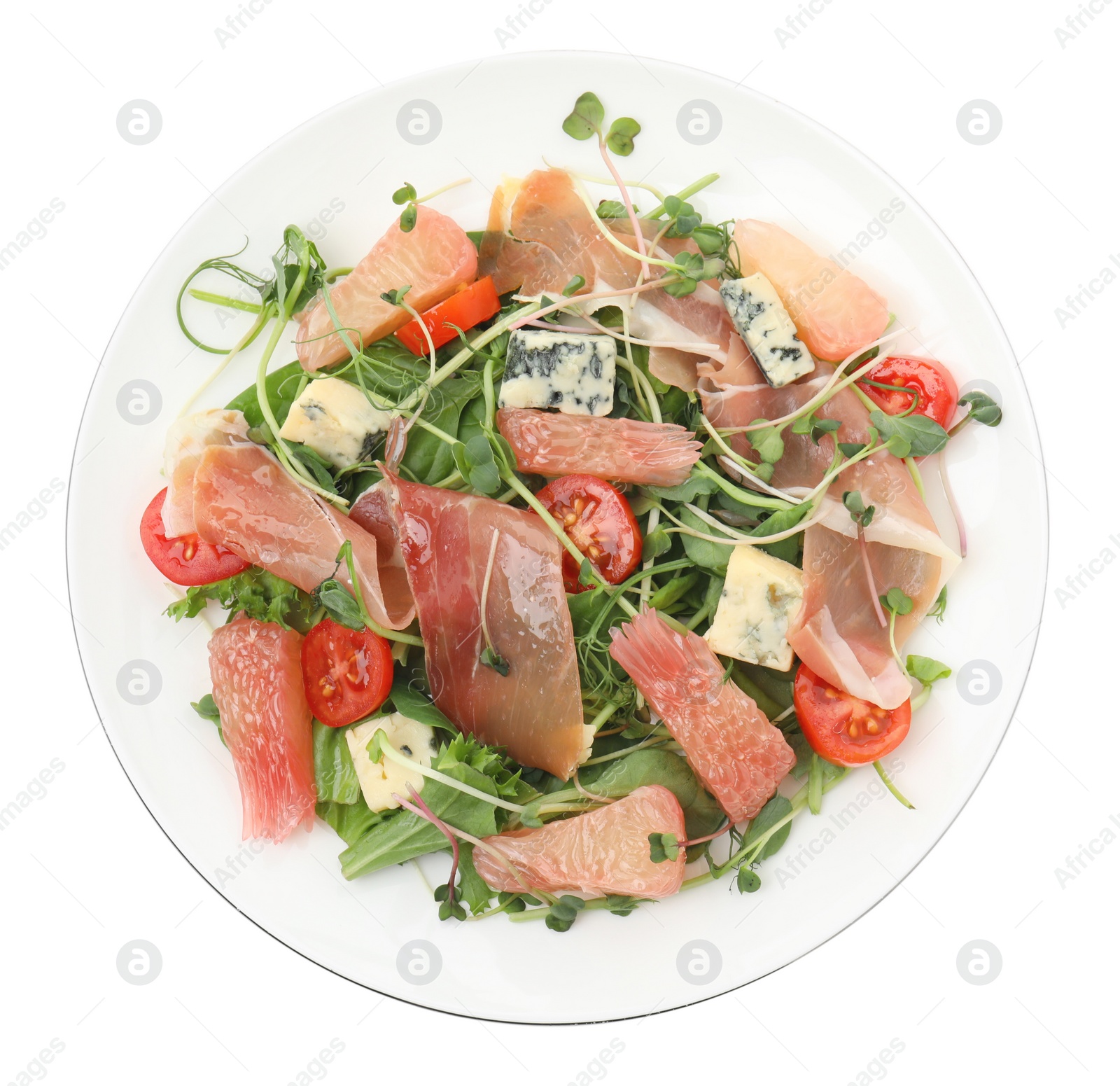 Photo of Delicious pomelo salad with prosciutto and cheese on white background, top view