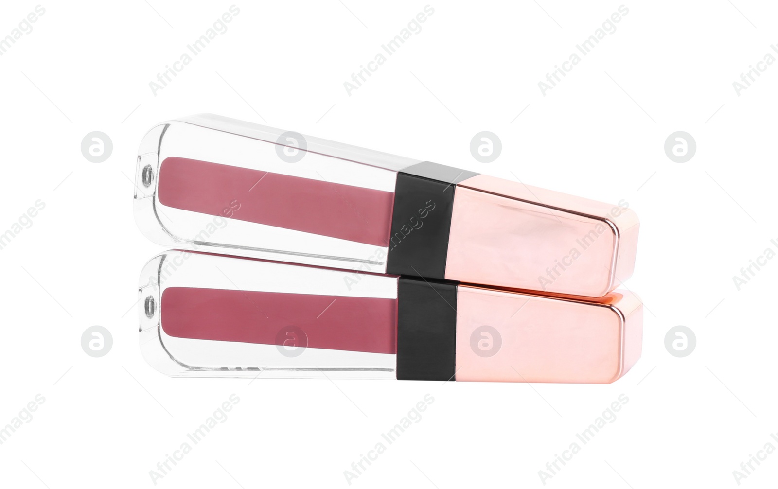 Photo of Two lip glosses isolated on white. Cosmetic products