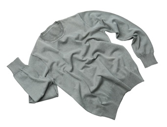 Photo of Warm grey sweater on white background, top view