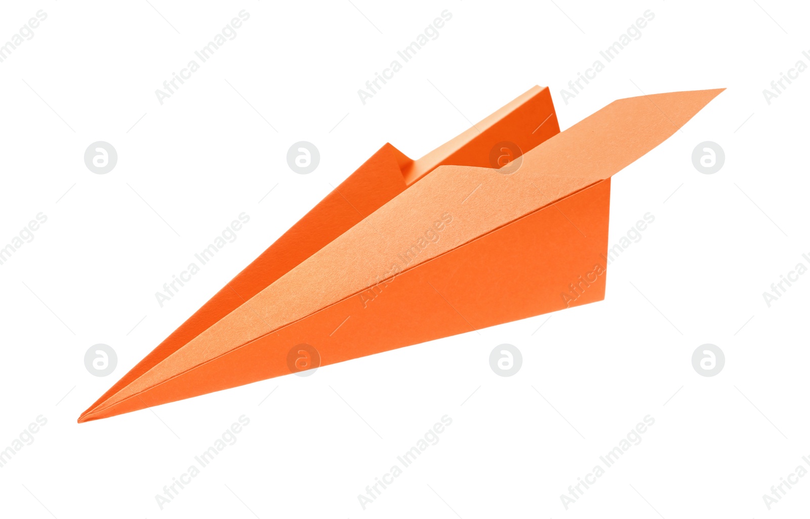 Photo of Handmade orange paper plane isolated on white