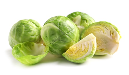 Fresh tasty Brussels sprouts on white background