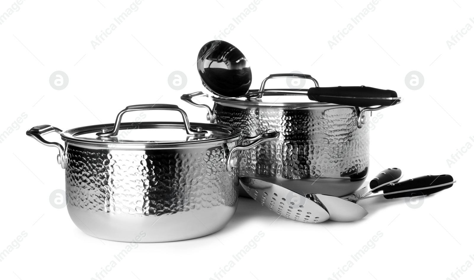 Photo of Set of clean cookware and utensils isolated on white