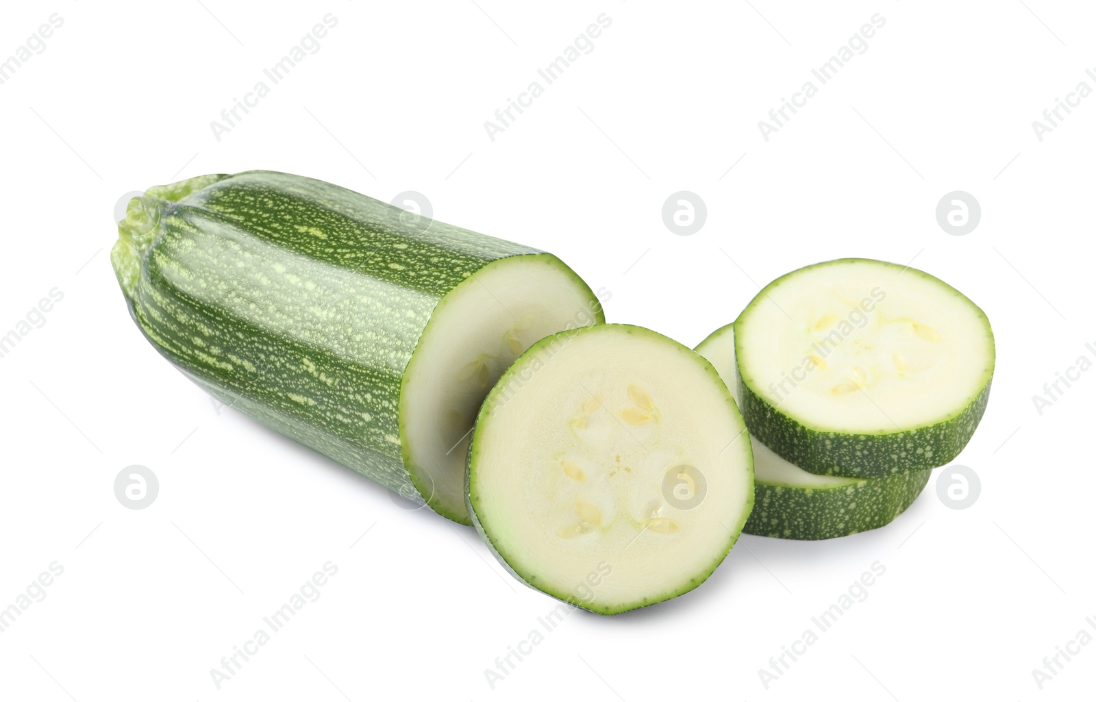 Photo of Cut green ripe zucchini isolated on white