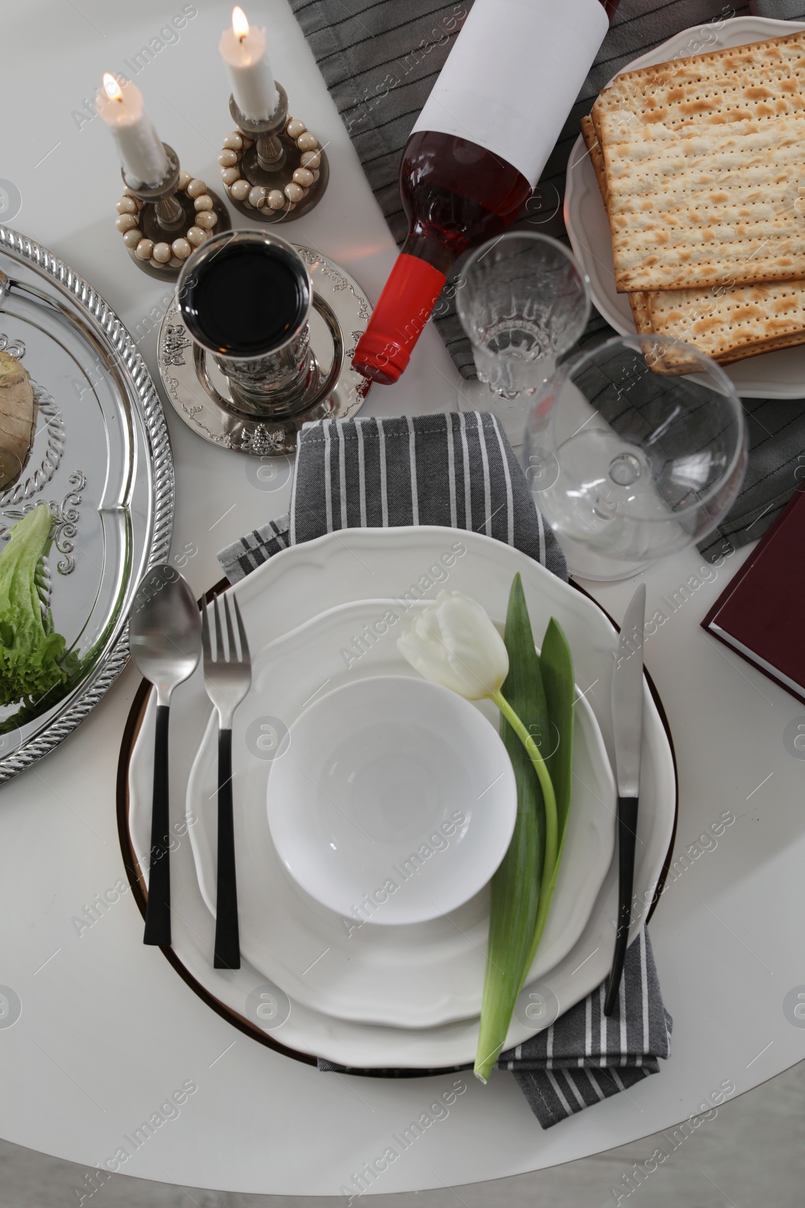 Photo of Festive Passover table setting, top view. Pesach celebration