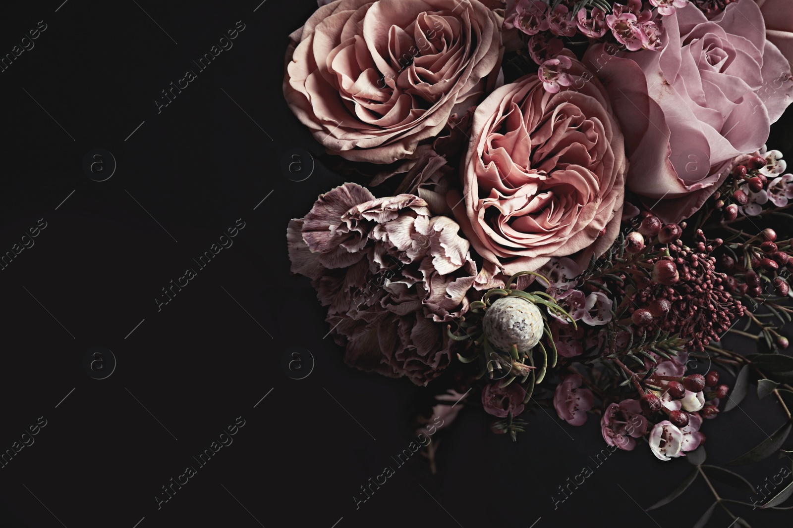 Photo of Beautiful bouquet on black background, closeup. Floral card design with dark vintage effect