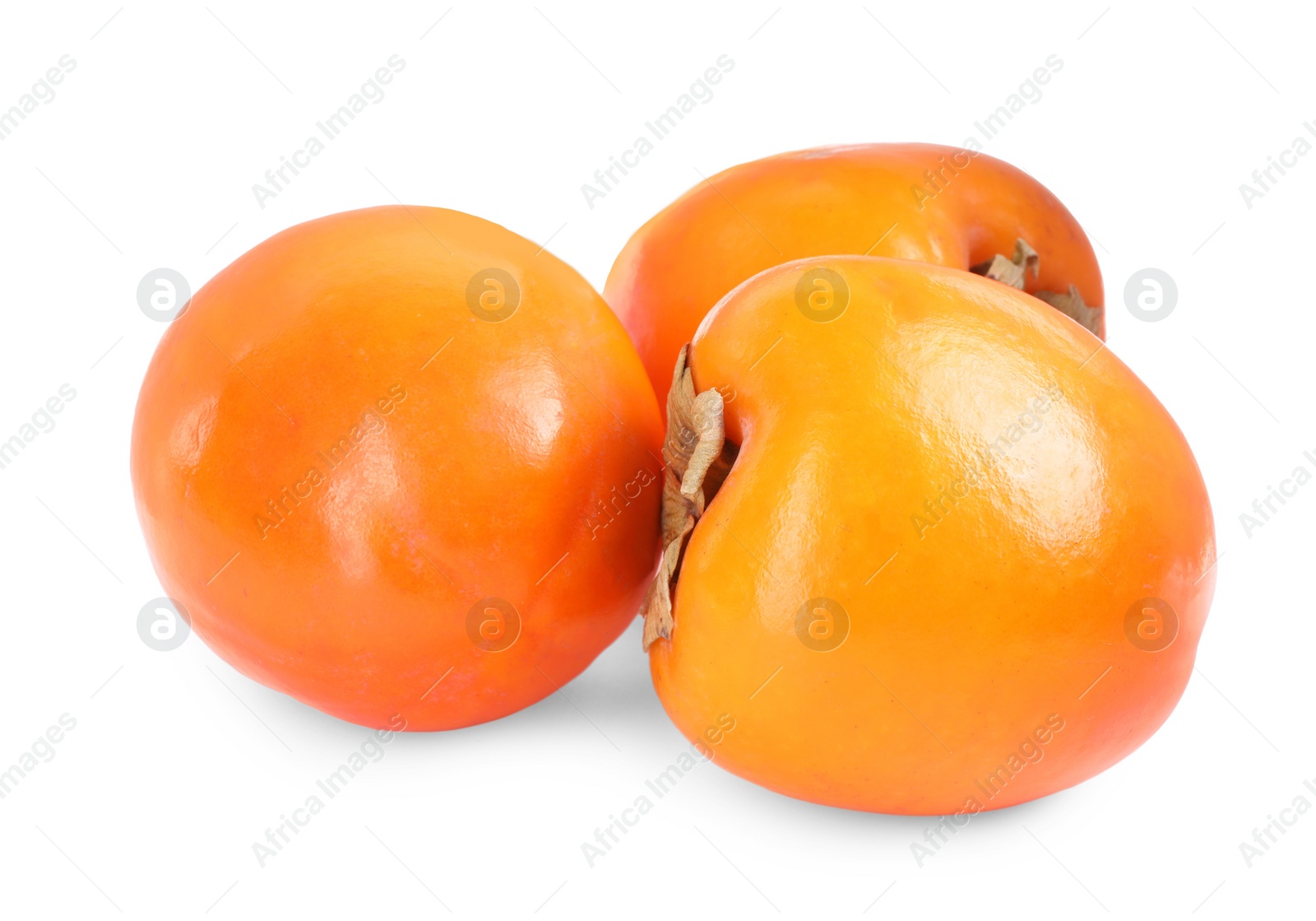 Photo of Delicious ripe juicy persimmons isolated on white