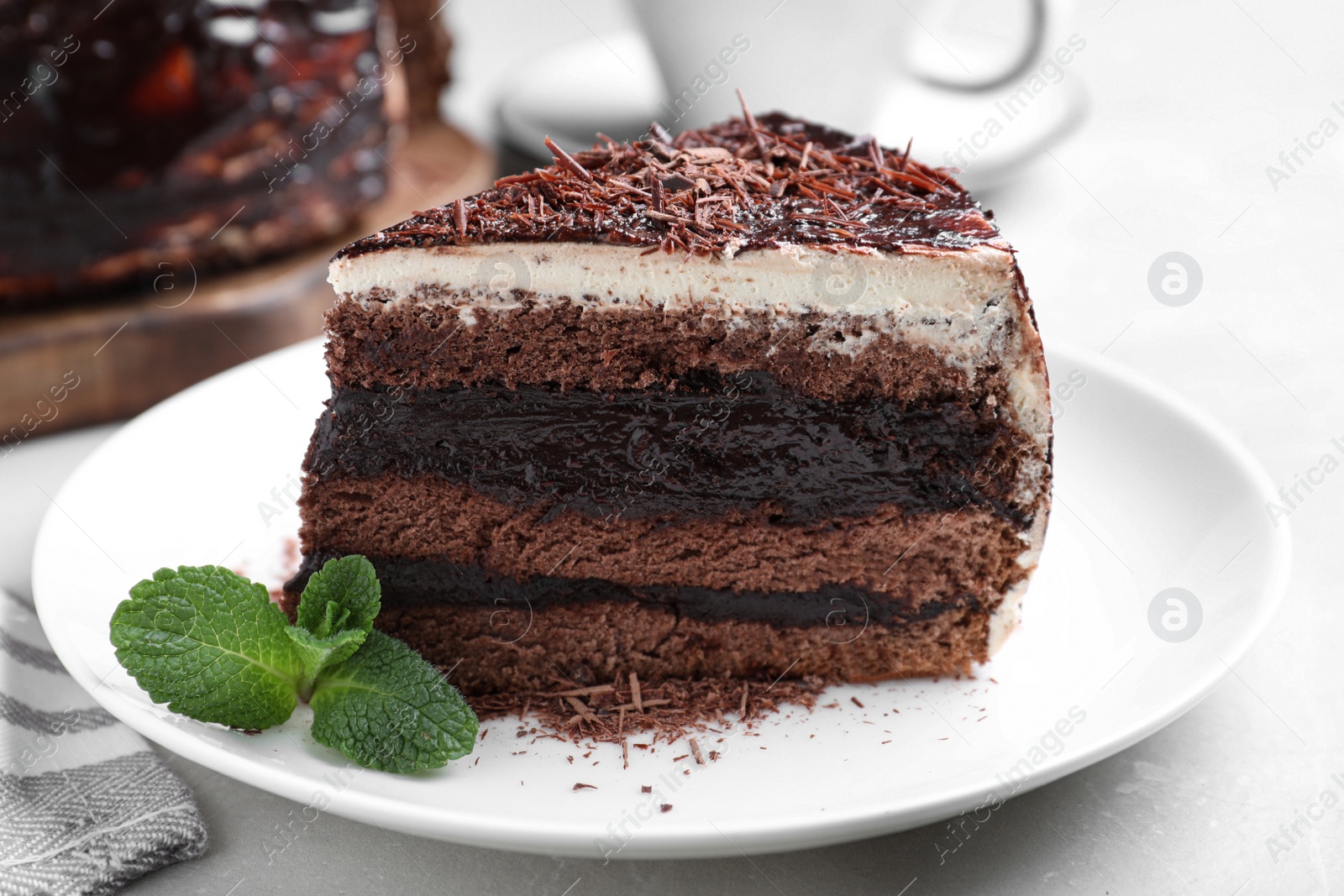 Photo of Tasty chocolate cake served on table, closeup