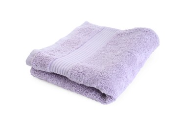 Photo of Folded violet terry towel isolated on white