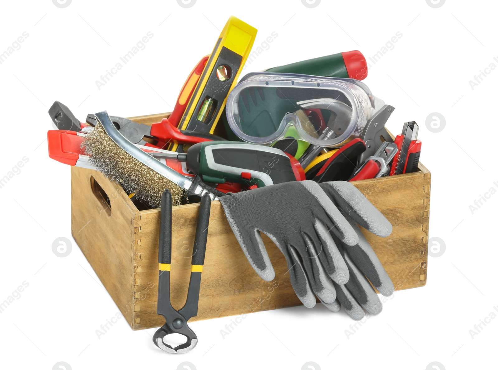 Photo of Wooden box with different tools isolated on white