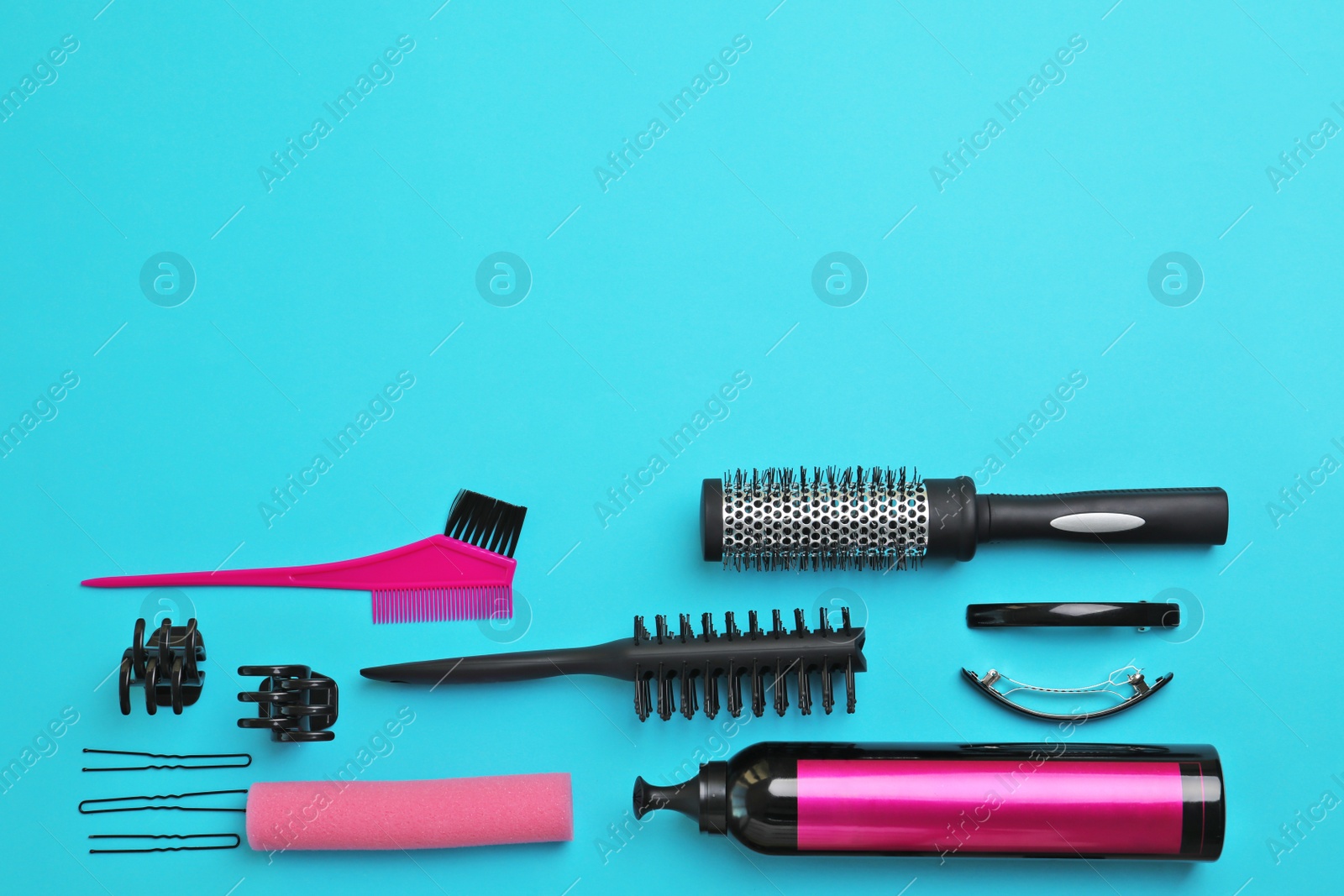 Photo of Professional hairdresser set on color background