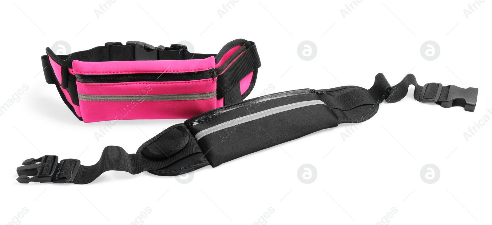 Photo of Stylish colorful waist bags isolated on white