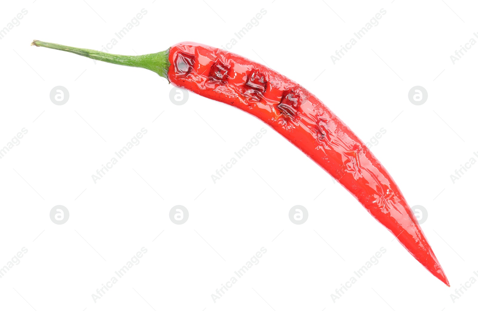 Photo of One grilled chili pepper isolated on white, top view