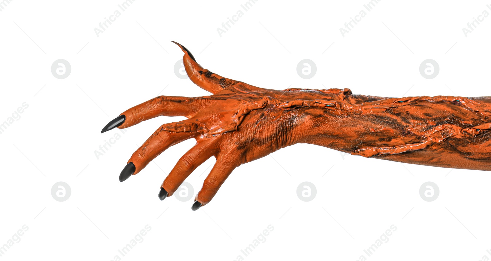 Image of Creepy monster. Orange hand with claws isolated on white