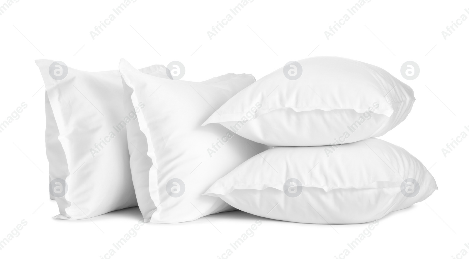 Photo of Many new soft pillows isolated on white