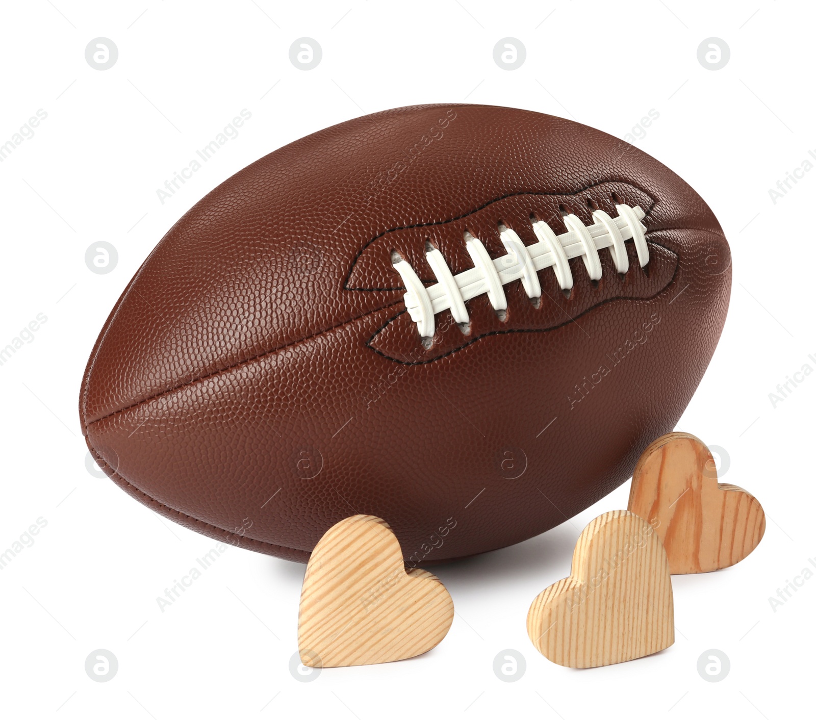 Photo of American football ball and hearts on white background