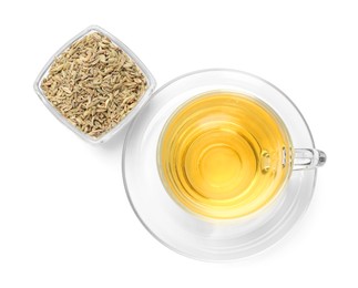 Photo of Aromatic fennel tea in cup and seeds isolated on white, top view