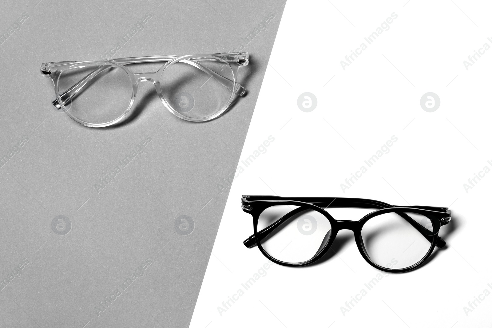 Photo of Stylish glasses on color background, flat lay