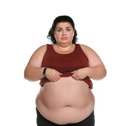 Photo of Emotional overweight woman posing on white background