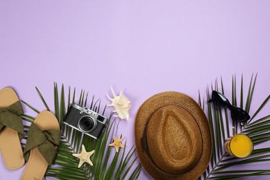 Photo of Flat lay composition with beach objects on violet background, space for text