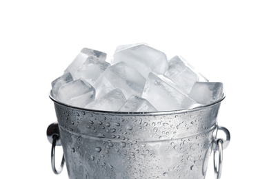 Photo of Metal bucket with ice cubes isolated on white