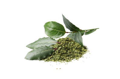 Heap of ground bay leaves and fresh twig on white background