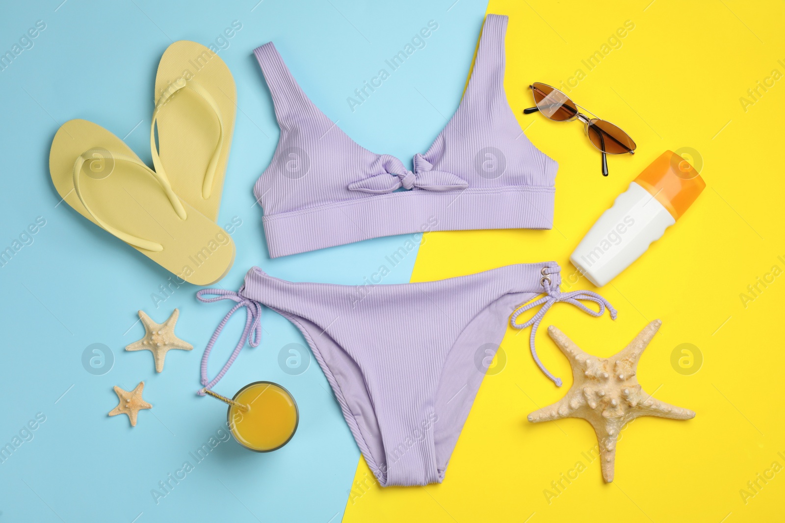 Photo of Flat lay composition with beach objects on color background