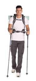 Photo of Male hiker with backpack and trekking poles on white background