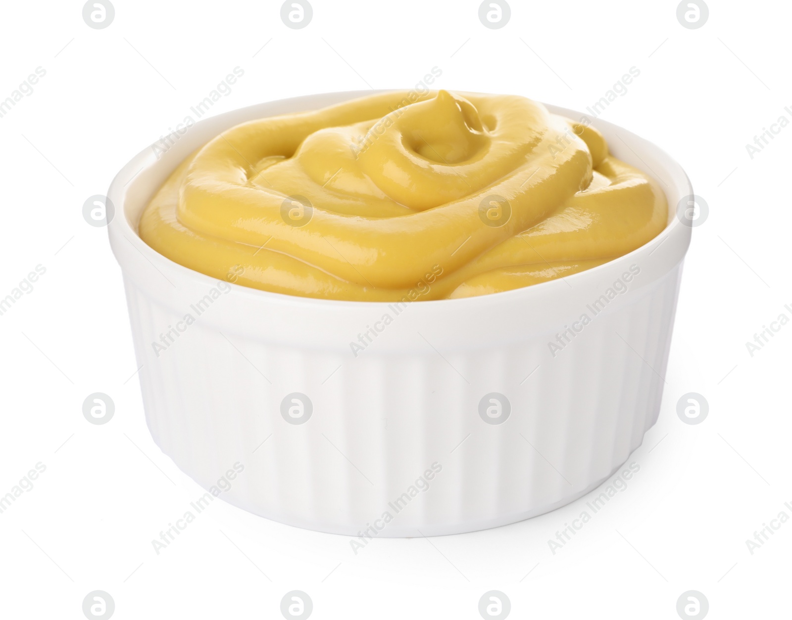 Photo of Spicy mustard in bowl isolated on white