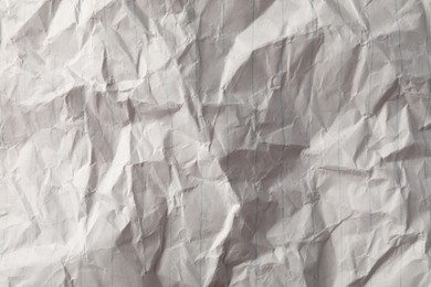 Crumpled sheet of paper as background, top view