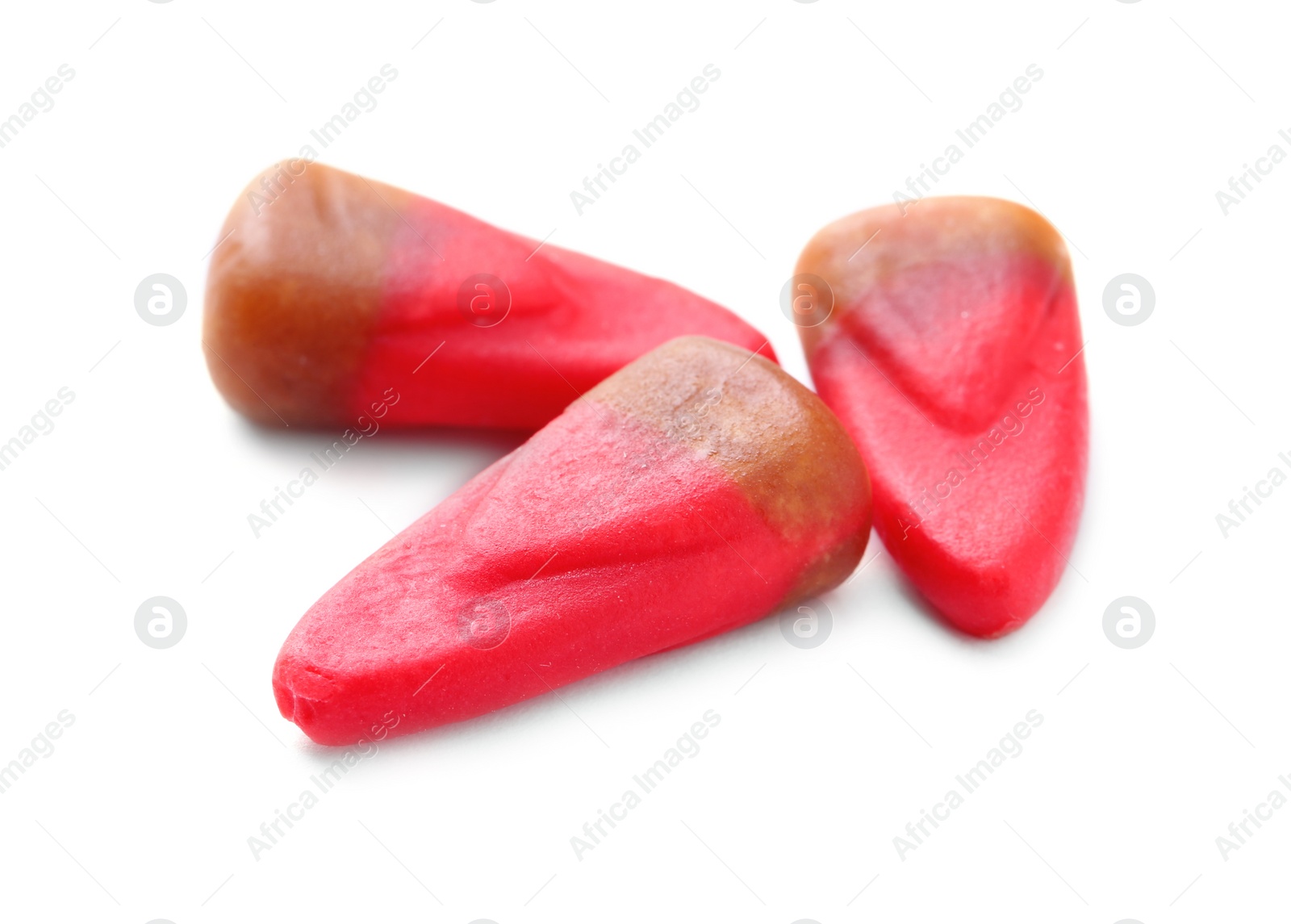 Photo of Colorful candy corns for Halloween party on white background