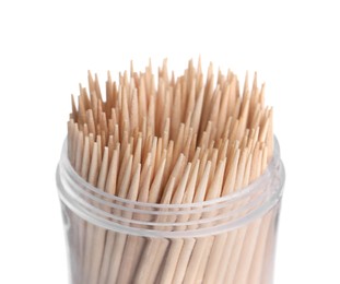 Wooden toothpicks in holder on white background, closeup