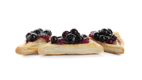 Photo of Fresh tasty puff pastry with sweet berries isolated on white