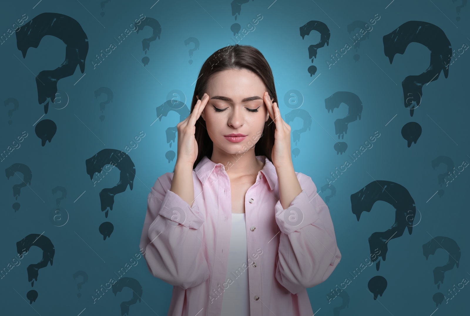 Image of Amnesia concept. Woman trying to remember something. Question marks on color background symbolizing memory loss