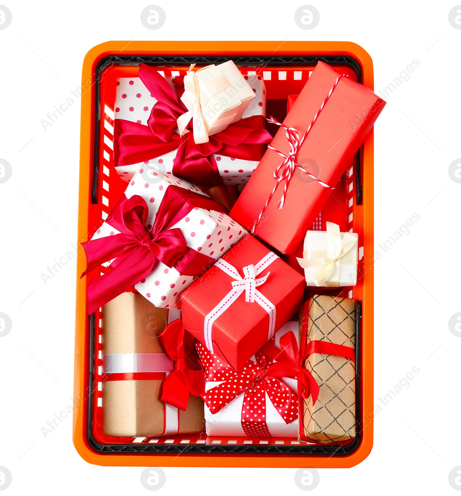 Photo of Shopping basket full of gift boxes on white background, top view