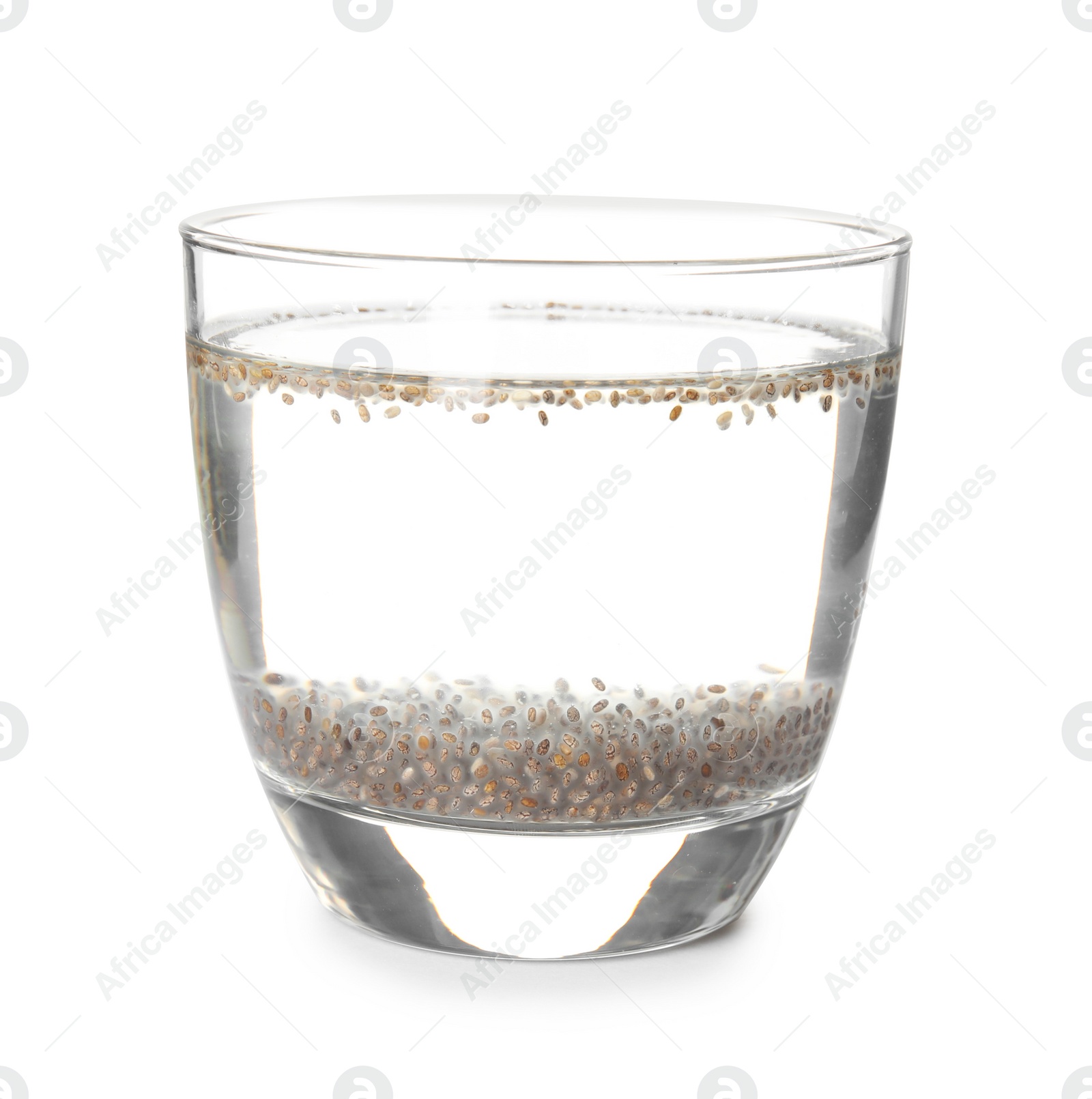 Photo of Glass of water with chia seeds on white background