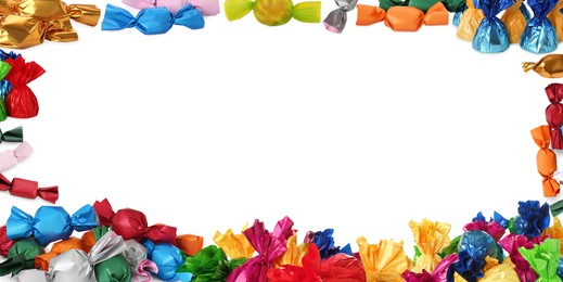 Image of Frame made of tasty candies in colorful wrappers on white background. Banner design