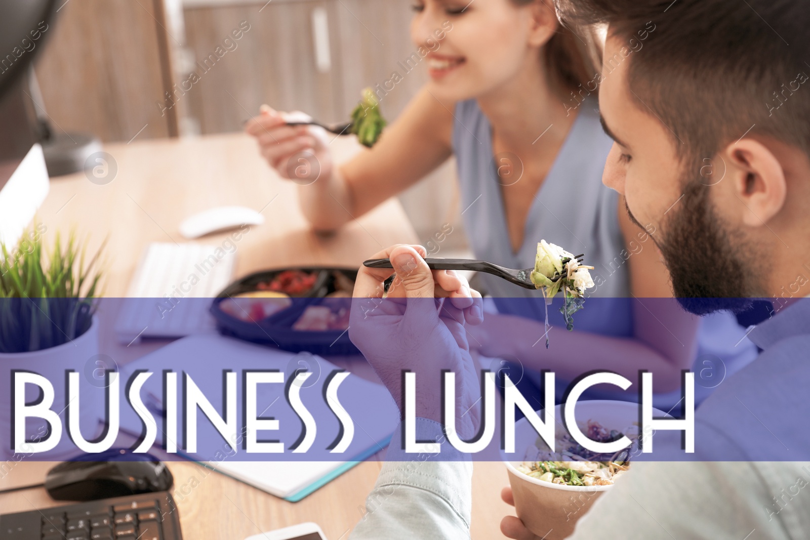 Image of Office employees eating at workplace. Business lunch