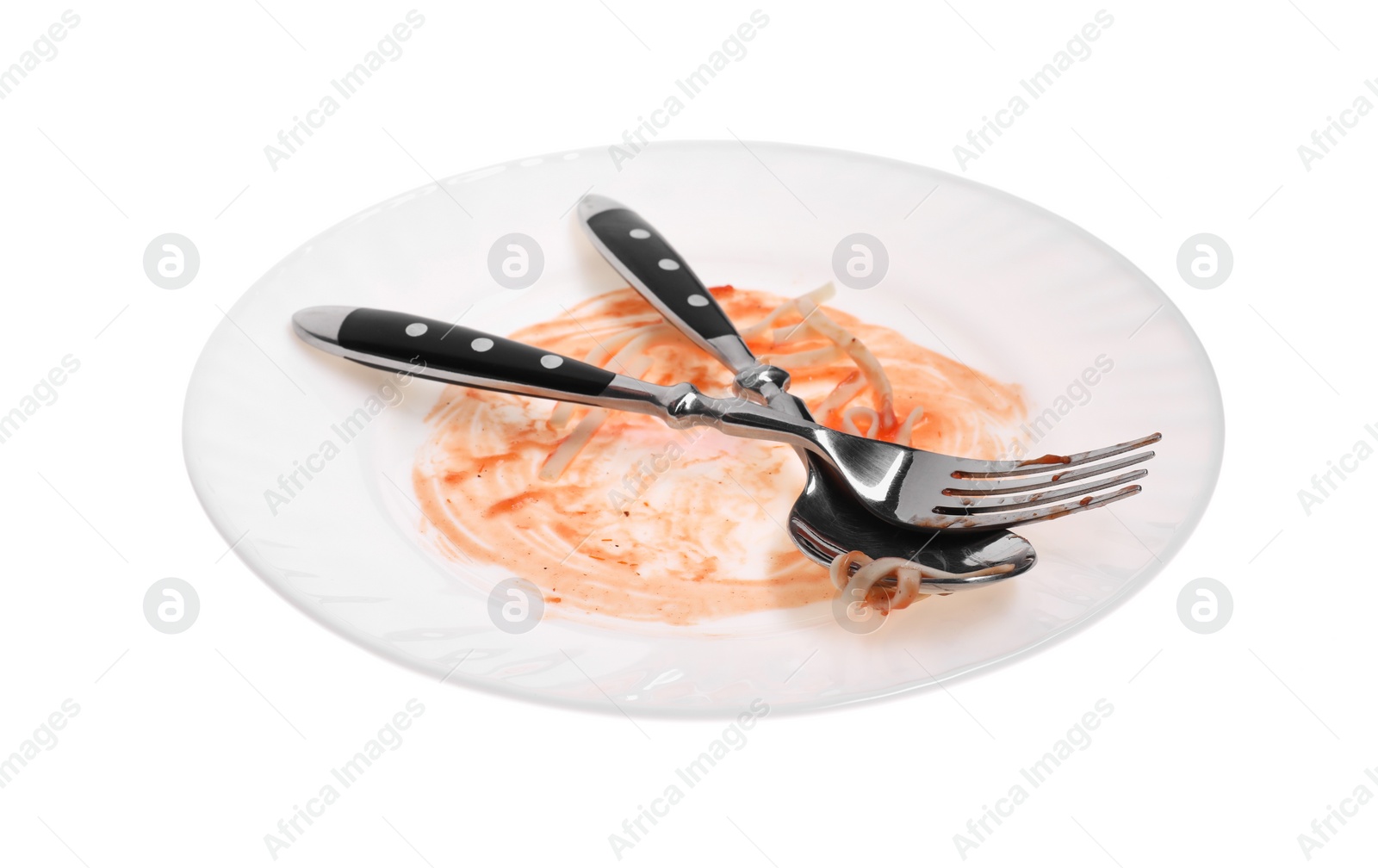 Photo of Dirty plate and cutlery on white background