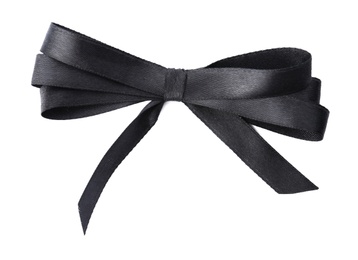 Photo of Black bow on white background, top view. Funeral symbol