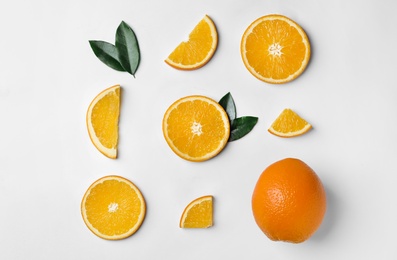 Photo of Flat lay composition with fresh oranges on white background