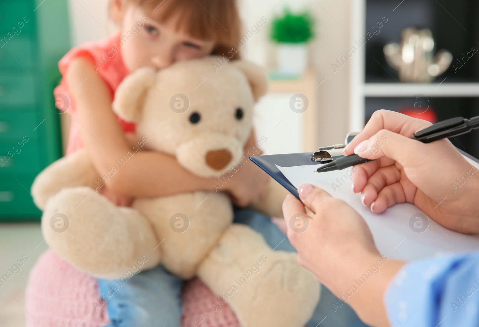 Photo of Cute little girl at child psychologist's office