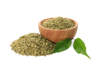 Photo of Wooden bowl with aromatic mate tea on white background