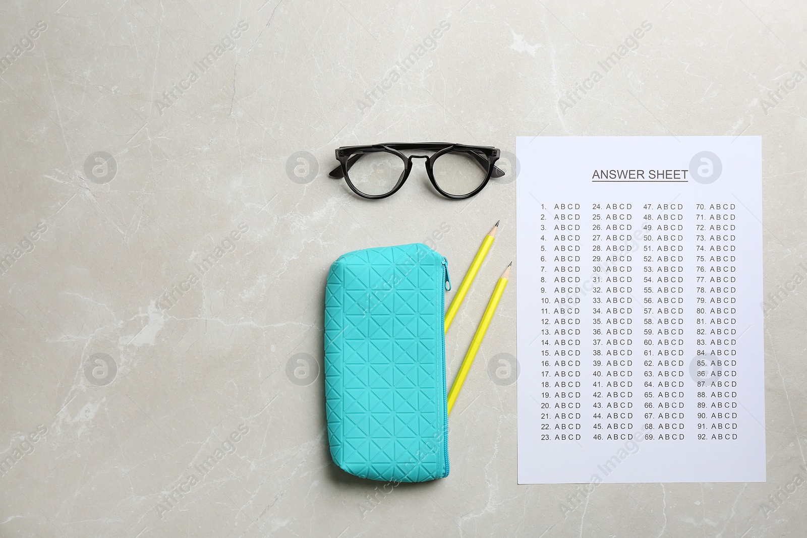 Photo of Flat lay composition with answer sheet and space for text on grey background