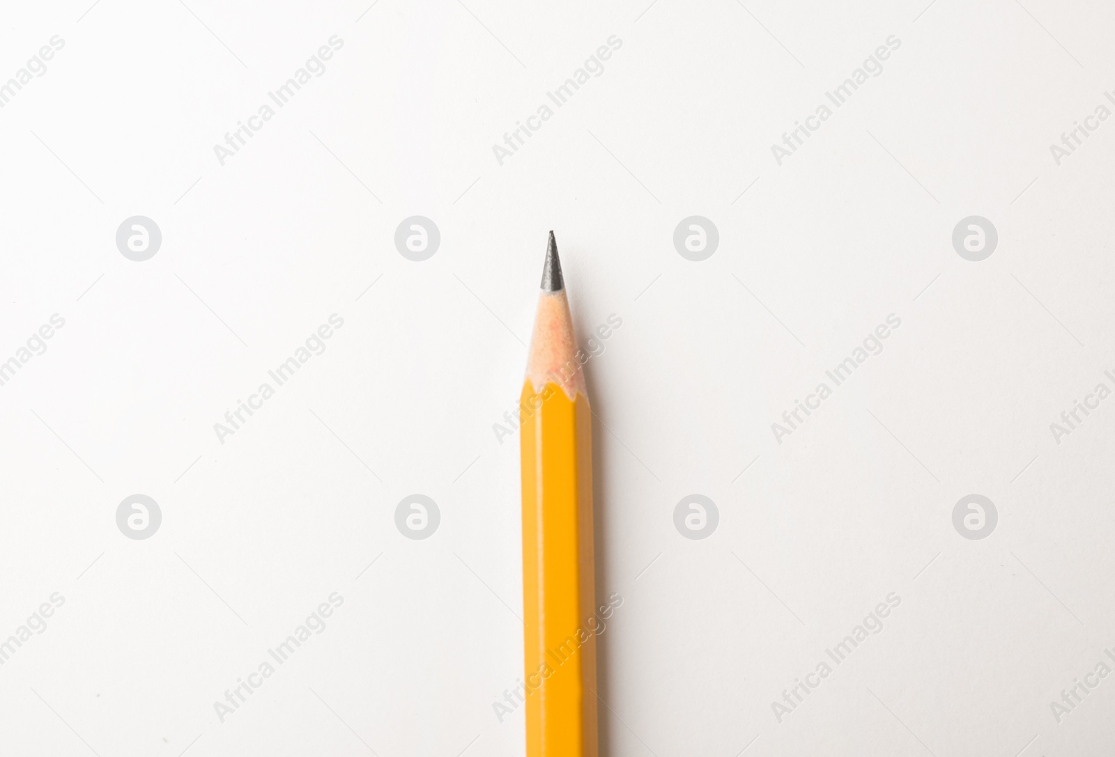 Photo of Sharp pencil isolated on white, top view