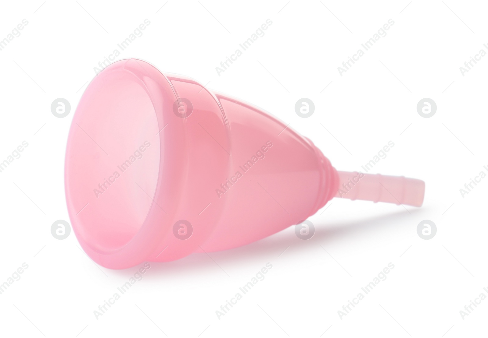 Photo of One pink menstrual cup isolated on white