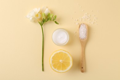 Flat lay composition with jar of cream on beige background. Body care product