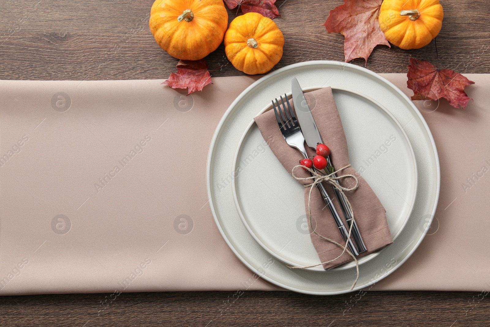 Photo of Thanksgiving day. Beautiful table setting and autumn decoration, flat lay. Space for text