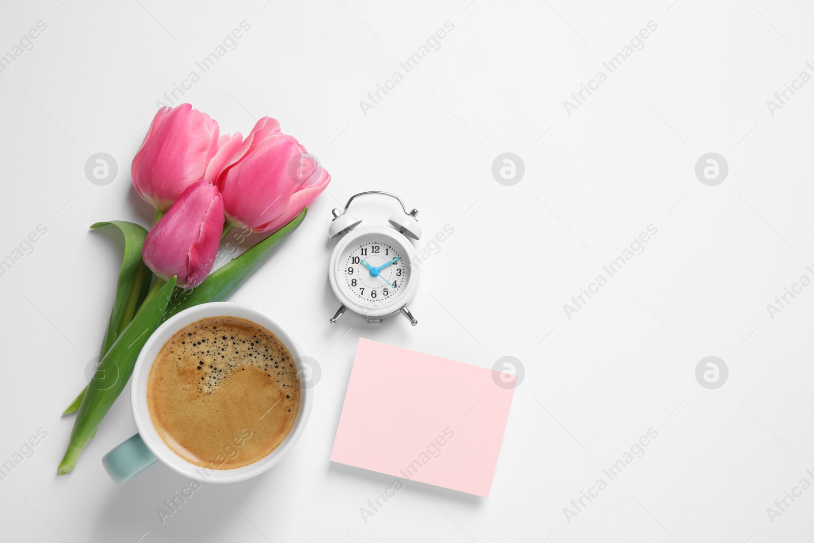 Photo of Composition with blank card and coffee on white background, top view. Good morning