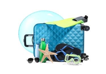 Photo of Suitcase, inflatable ring and other beach accessories isolated on white